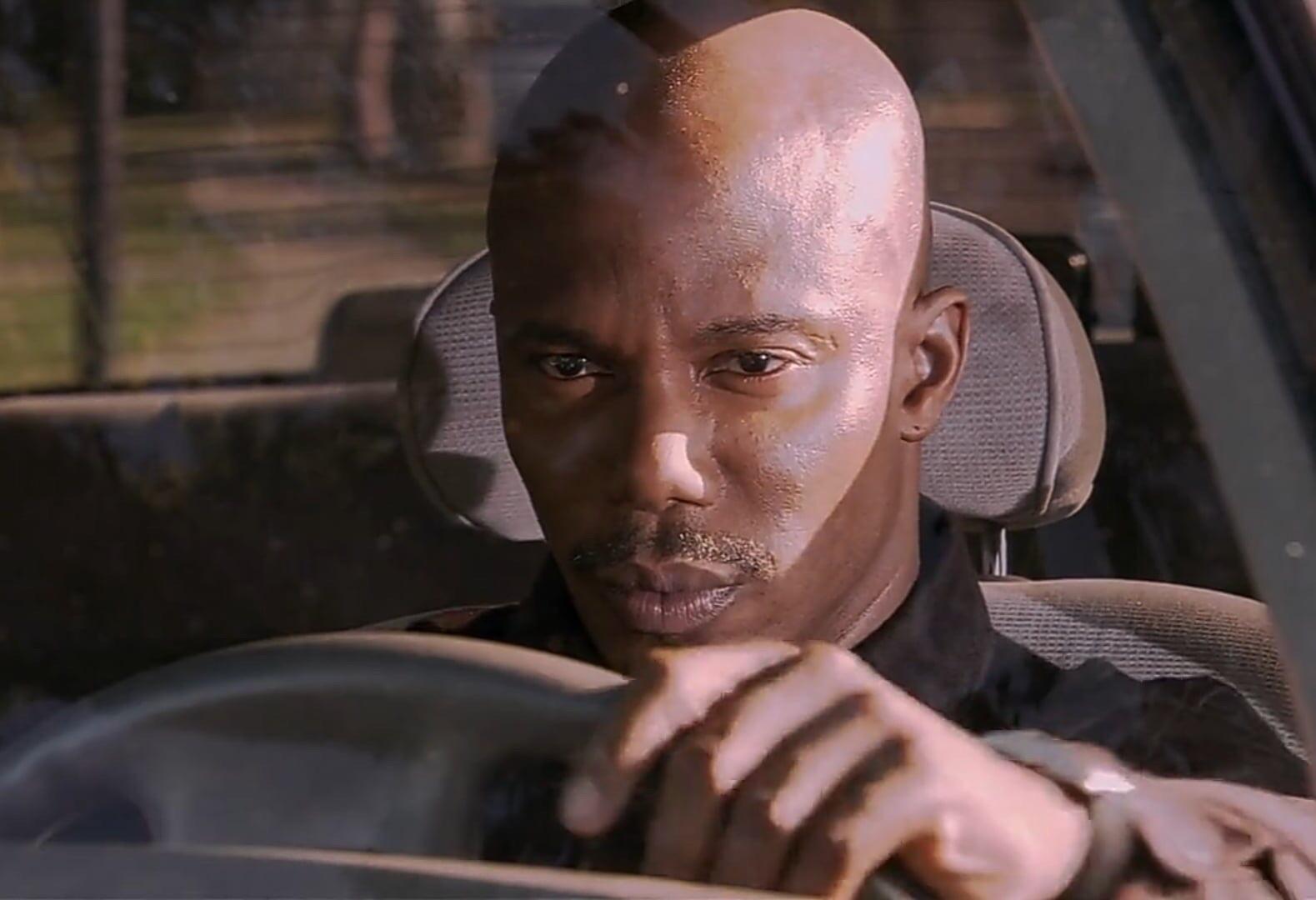 A suspicious bouncer looking you up and down